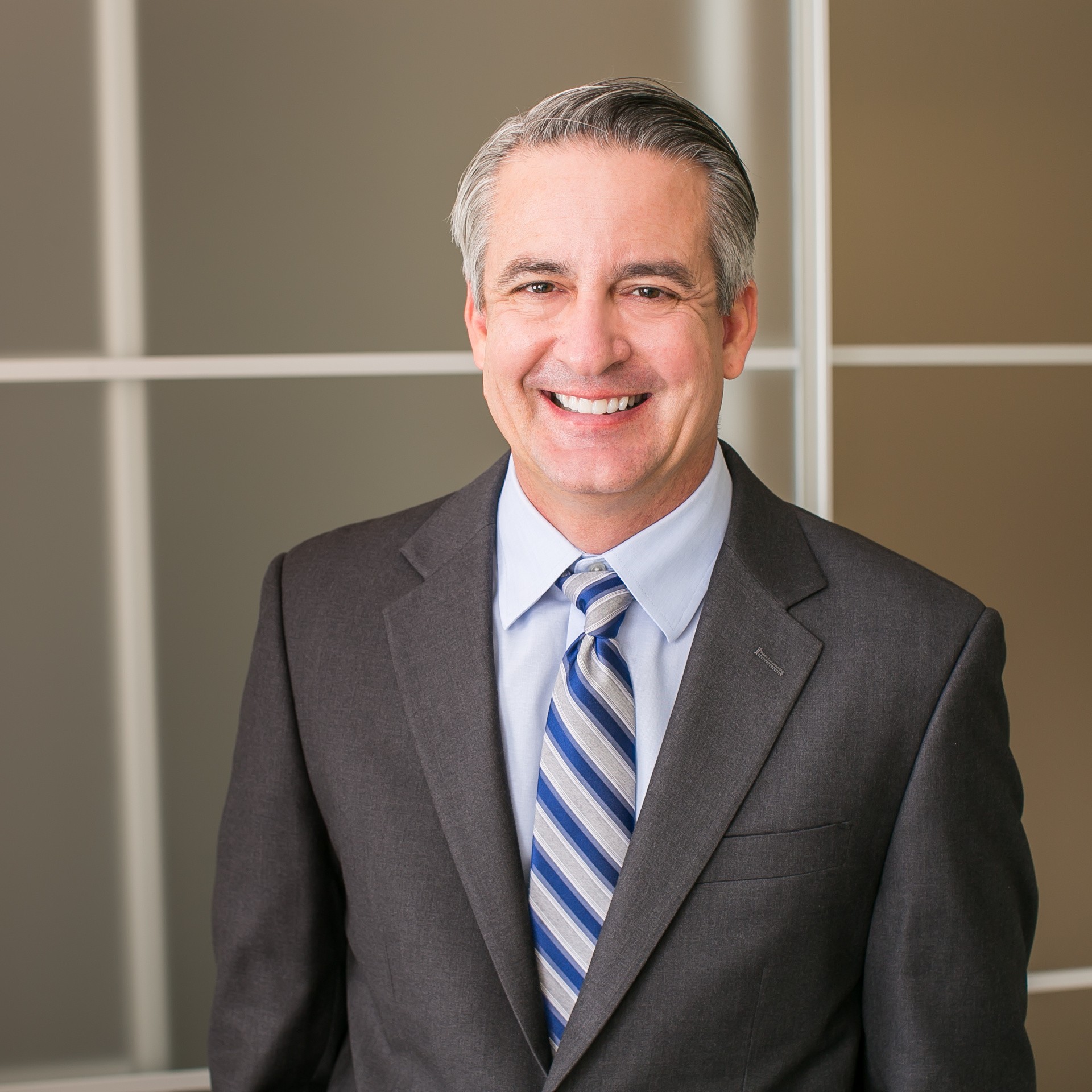 Mature happy smiling business man in an office