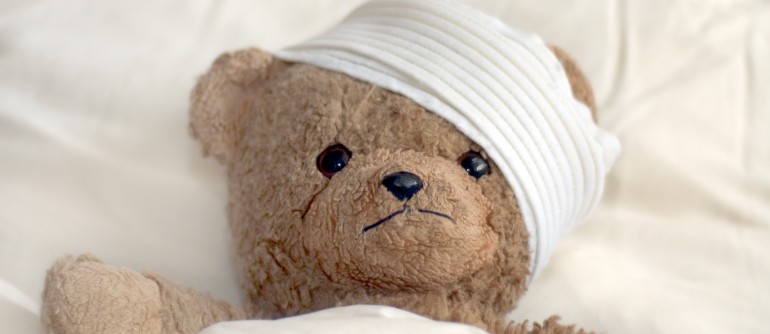 Photo of a teddy bear with bandage